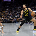 Stephen Curry brilha com drible épico e virada histórica
